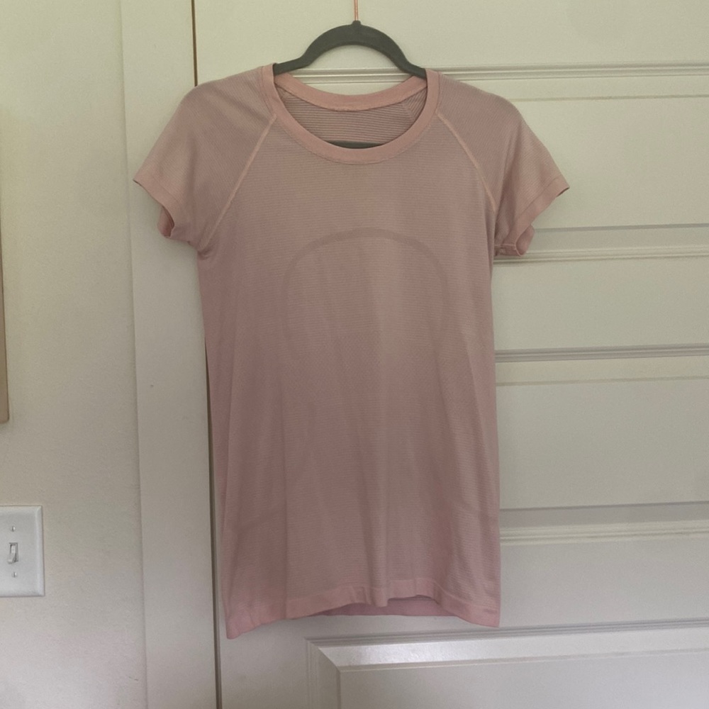 Light pink swiftly tech size 8